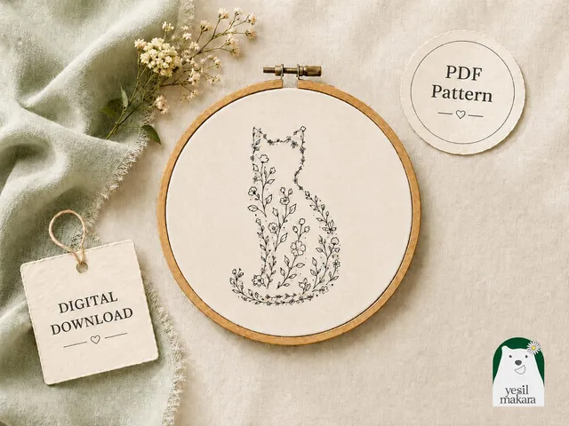 Nakış kasnağında, çiçeklerden oluşan bir kedi silueti deseni
