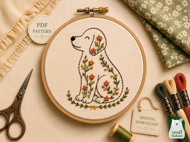 Nakış kasnağında, çiçeklerle işlenmiş oturan bir köpek deseni